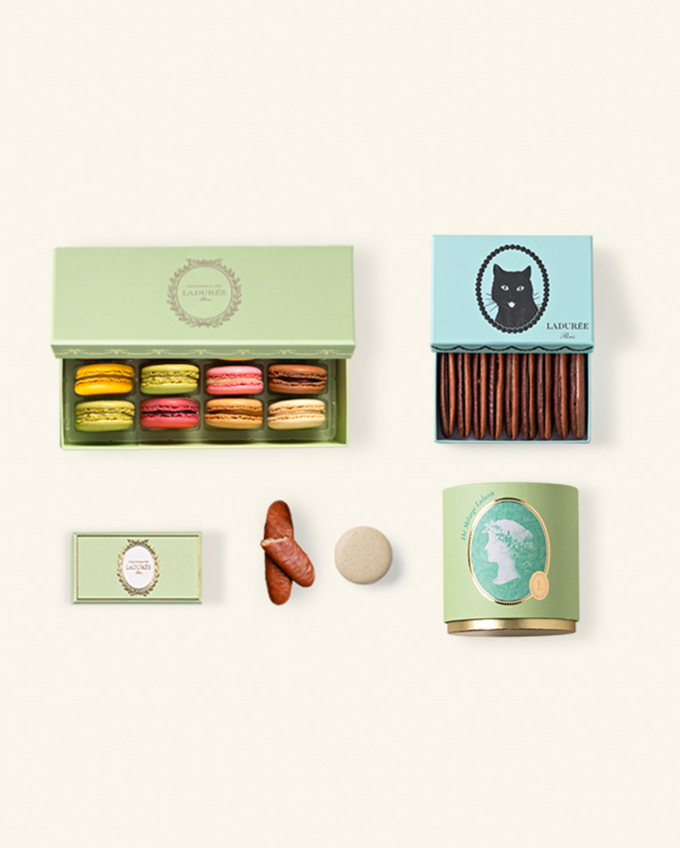 Assortiment Ladurée « L’Art du Tea Time » avec macarons, thé, chocolats et langues de chat pour la Fête des Pères